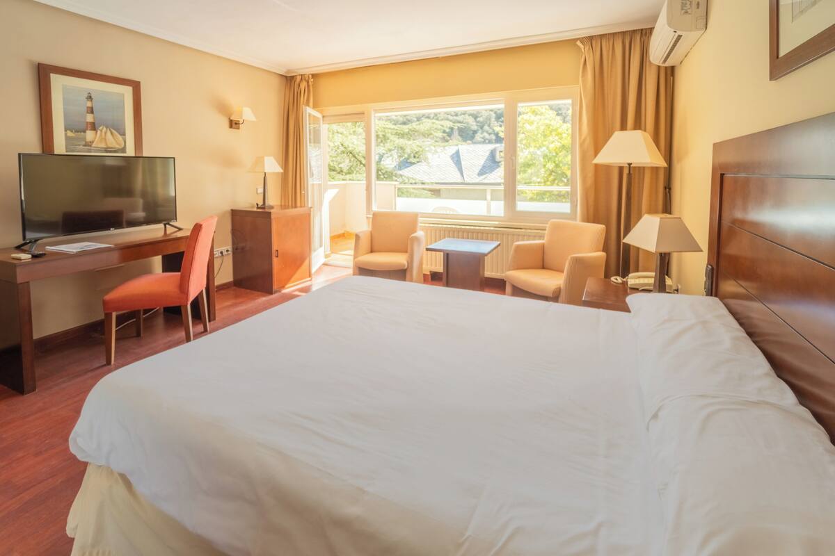 Habitación estándar doble, vistas parciales al lago | Wifi gratis