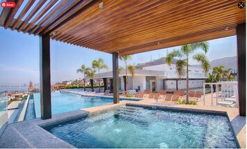 Pool side hot tub with spa jets and views forever!