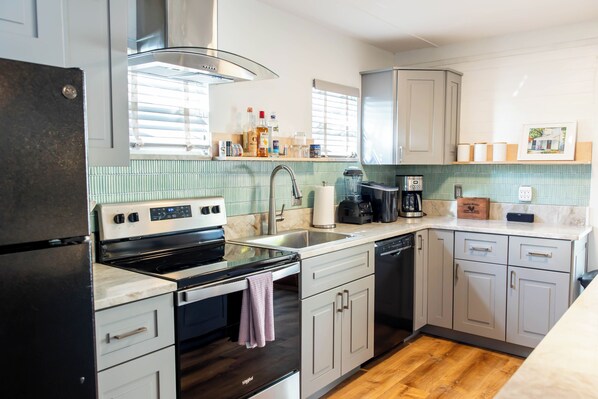 Fridge, dishwasher, cookware/dishes/utensils