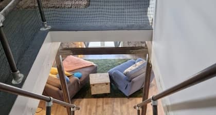 Countryside, two-level studio, built in an old barn.