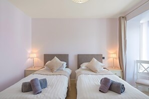 4 bedrooms, iron/ironing board, travel cot, WiFi