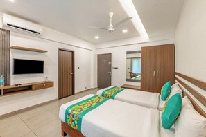 In-room safe, desk, blackout curtains, iron/ironing board - Treebo De Cloud 9 Regency (Thiruvananthapuram)