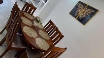Deluxe Apartment, Balcony, Pool View | Living area | 24-inch Smart TV with digital channels