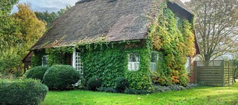 Chalet 'Reetdachchalet' with Private Terrace and Private Garden