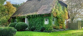 Chalet 'Reetdachchalet' with Private Terrace and Private Garden