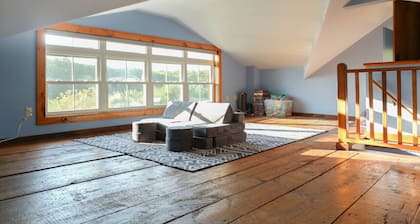 Step Back in Time with Modern Comforts: Historic 1820s Farmhouse on Wade Pond