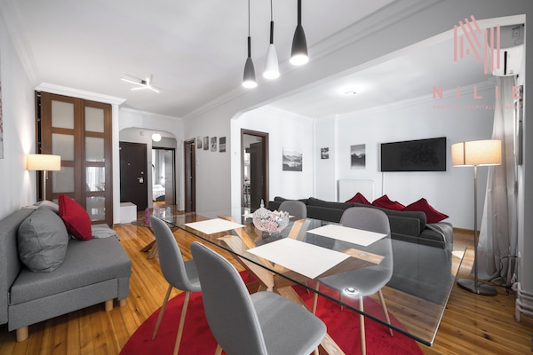 Apartment, Balcony, City View | Living area | Flat-screen TV