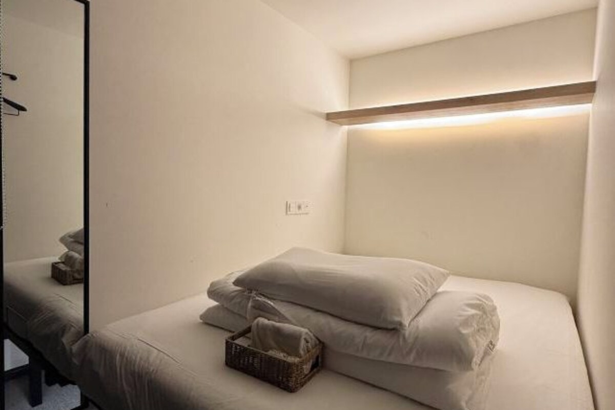 Memory foam beds, laptop workspace, WiFi (free)