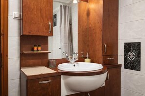 Hair dryer, towels, soap, shampoo