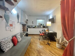 Apartment, Non Smoking | Living area | Flat-screen TV - Happy Family Apartments Baia Boccadasse (Genoa)