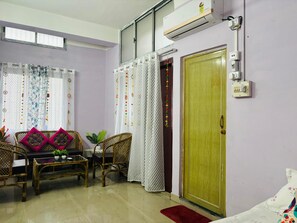 Deluxe Quadruple Room, City View | Free WiFi, bed sheets - Ashray Homestay (Guwahati)