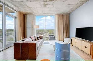 TV, offices - Luxury Rainey Condo • Pool & Gym • Walk to Bars (Austin)
