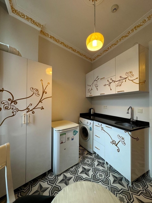 Chambre Familiale, vue ville | Coin cuisine privé