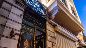 A building facade with a prominent sign for 'Felicity Palace.' - Felicity Palace Sirkeci (Istanbul)
