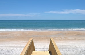 A wooden boardwalk leading to a sandy beach with a clear view of the ocean. - Carolina Charm - Classic 3BR Oceanfront Cottage, Dog Friendly! (Surf City)