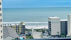 A coastal hotel with a view of the beach, multiple floors, and a parking area. - OD tower II #12, ocean view Fantastic condo + pool (Myrtle Beach)