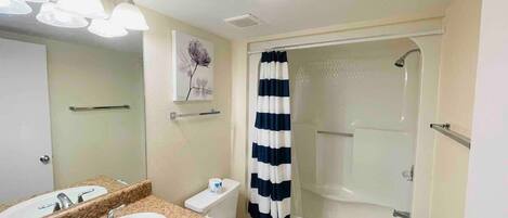 Shower, hair dryer, towels