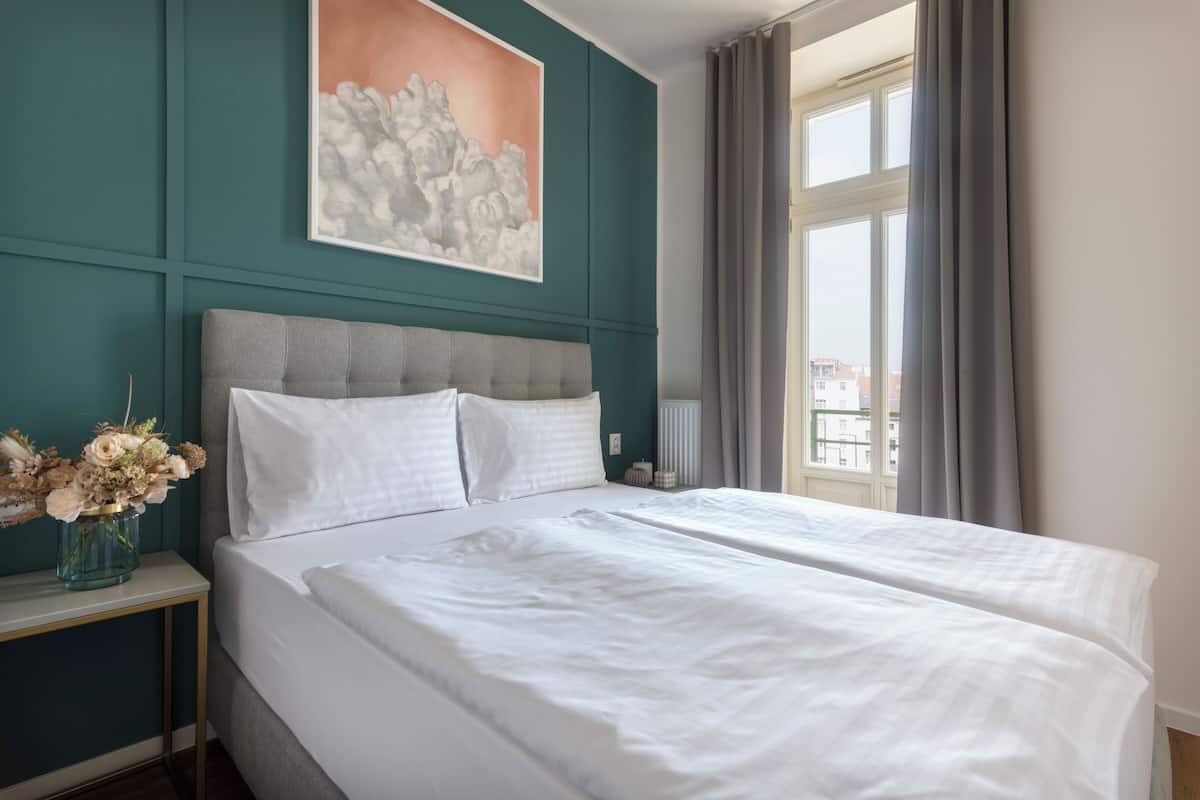 Deluxe Apartment, Balcony | 1 bedroom, blackout drapes, soundproofing, iron/ironing board