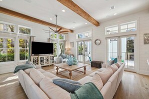 TV connectée, table de tennis de table, livres, espaces bureaux