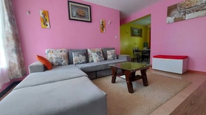 Family Apartment, Balcony, Pool View | Living area