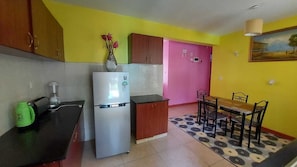 Family Apartment, Balcony, Pool View | Living area
