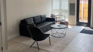 Living area - Right at Home Plate - 2BDR, 2.5 BA - 2 Blocks from Navy Yard Metro! (Washington)