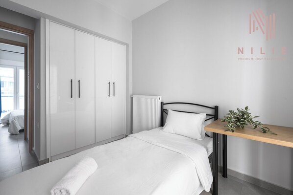 Familienapartment, Balkon, Stadtblick | 2 Schlafzimmer, kostenloses WLAN