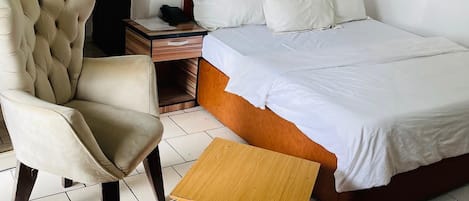 Suite, balcón, vistas a la ciudad | 1 dormitorio y wifi gratis