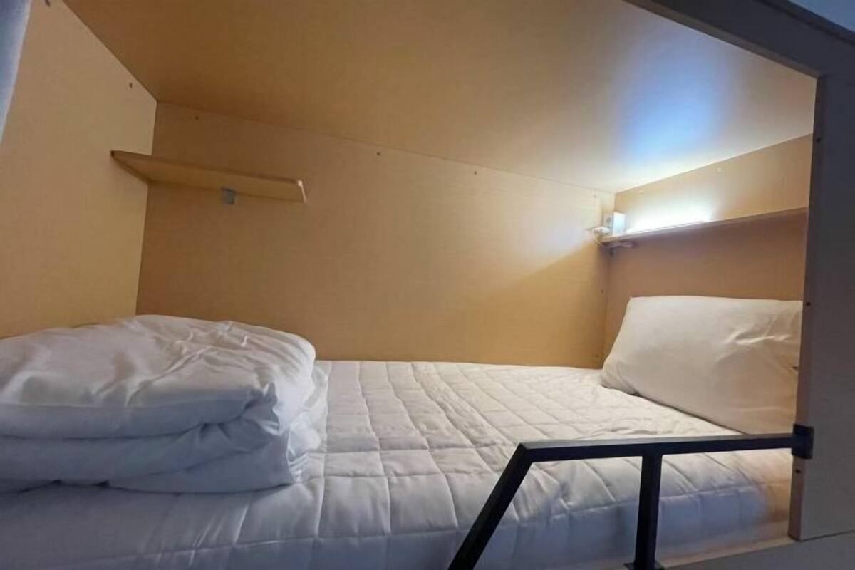 Blackout drapes, soundproofing, iron/ironing board (on request)