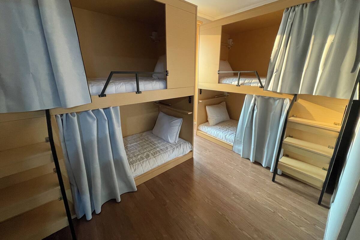 Blackout drapes, soundproofing, iron/ironing board (on request)