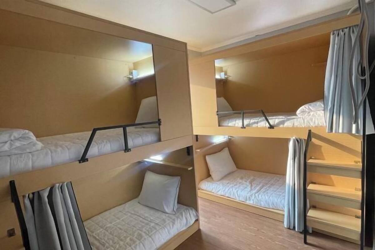 Blackout drapes, soundproofing, iron/ironing board (on request)
