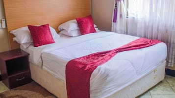 Desk, laptop workspace, free WiFi, bed sheets