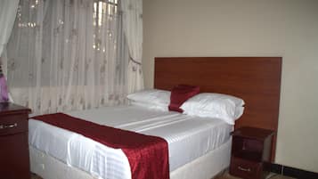 Desk, laptop workspace, free WiFi, bed sheets