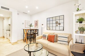 Family Duplex | Living area | 50-inch TV with cable channels