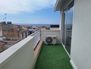 Habitación, 1 habitación, balcón, vista a la ciudad | Balcón