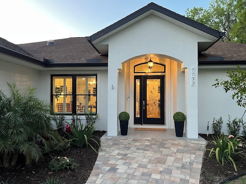 Modern 3-bedroom home close to WEC with a beautifully furnished home and patio