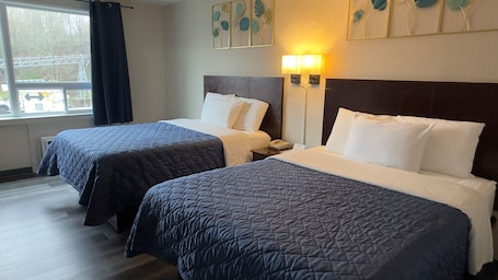 Ropa de cama de alta calidad y colchones con pillow-top . Town Centre Inn - Parry Sound