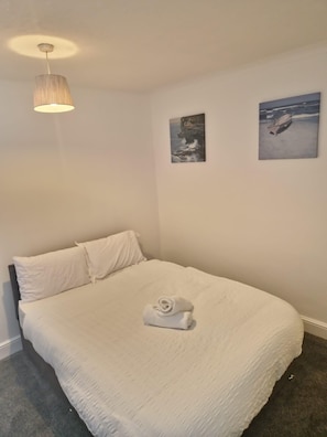 Casa | 4 dormitorios, tabla de planchar con plancha, wifi gratis y ropa de cama
