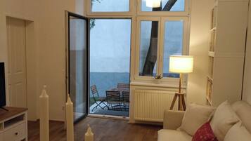 Apartamento | Zona de estar | Una televisión de pantalla plana