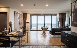 Presidential Suite, 3 Bedrooms, Connecting Rooms, Canal View | In-room dining - Odela West Tower Riverside Apt Hotel (Ho Chi Minh City)