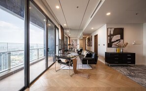 Presidential Suite, 3 Bedrooms, Connecting Rooms, Canal View | Living area | 65-inch Smart TV with cable channels, Netflix, smart speakers - Odela West Tower Riverside Apt Hotel (Ho Chi Minh City)