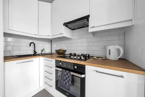 Fridge, oven, stovetop, dishwasher - Warsaw Powiśle Apartment - 8th Floor with Balcony - by Rentujemy (Warszawa)