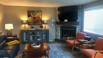 Smart TV, fireplace, DVD player, books