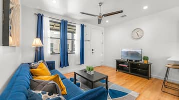 Apartment, 2 Bedrooms, Balcony, City View | Living area | 55-inch Smart TV with digital channels, Netflix, streaming services