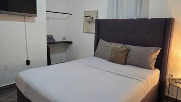 2 bedrooms, desk, iron/ironing board, travel crib