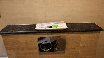 Shower, towels, soap, shampoo