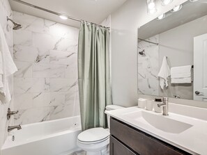 Hair dryer, towels, soap, toilet paper