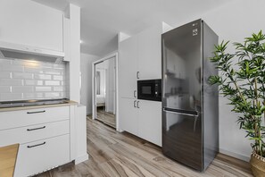 Fridge, microwave, dishwasher, coffee/tea maker