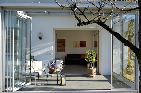 Terrace/patio. Farmhouse 'Appartment Gut Wendlandt' with Mountain View, Shared Pool and Wi-Fi