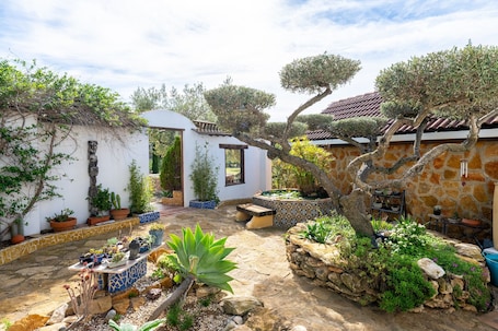 Terrace/patio. Cabin 'Casa Arbol ' with Sea View, Shared Pool and Wi-Fi